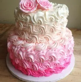 A cake made at Bird-in-Hand Bakery and Cafe with roses made of frosting