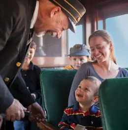 Strasburg Railroad: Boy and mom smiling on Strasburg Railroad train ride.