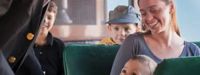 Strasburg Railroad: Boy and mom smiling on Strasburg Railroad train ride.