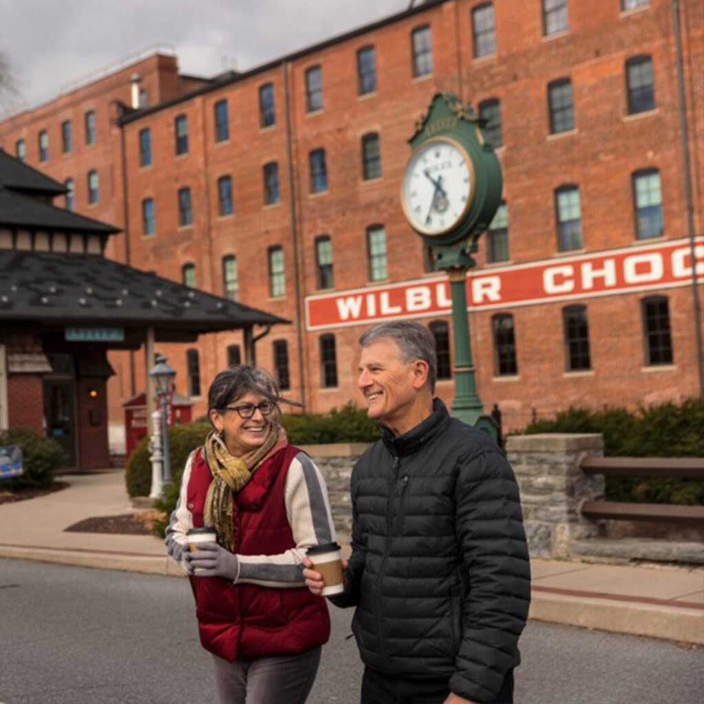 Couple walking through Lititz, PA